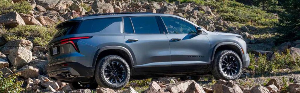 2025 Chevy Traverse showing off-road prowess on a mountain road